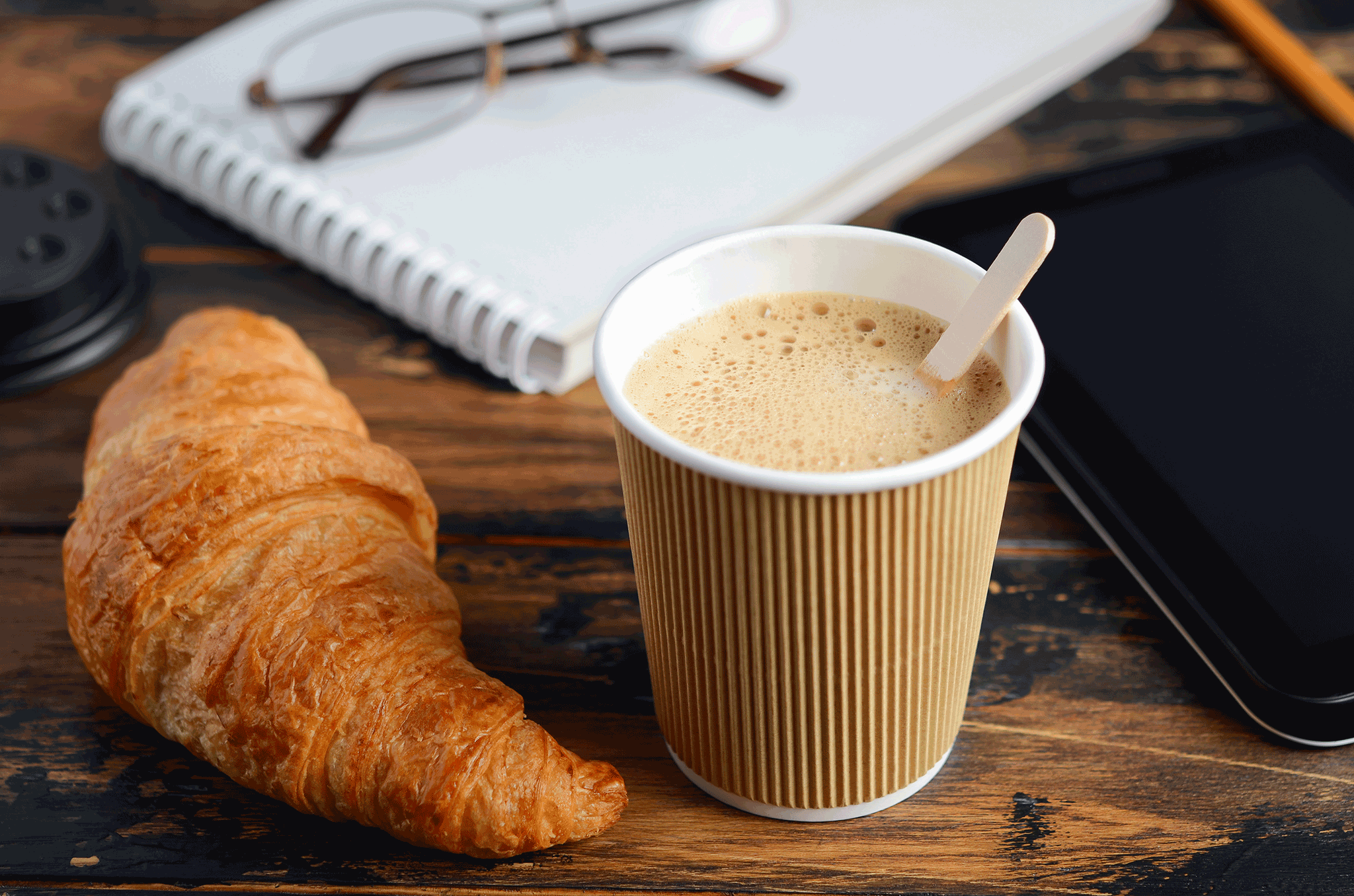 Coffee and croissant for a business meeting