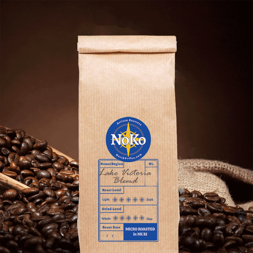 A bag of North Koffee's Lake Victoria Blend surrounded by coffee beans